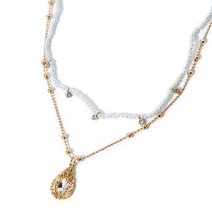 Elegant Gold and White Necklace